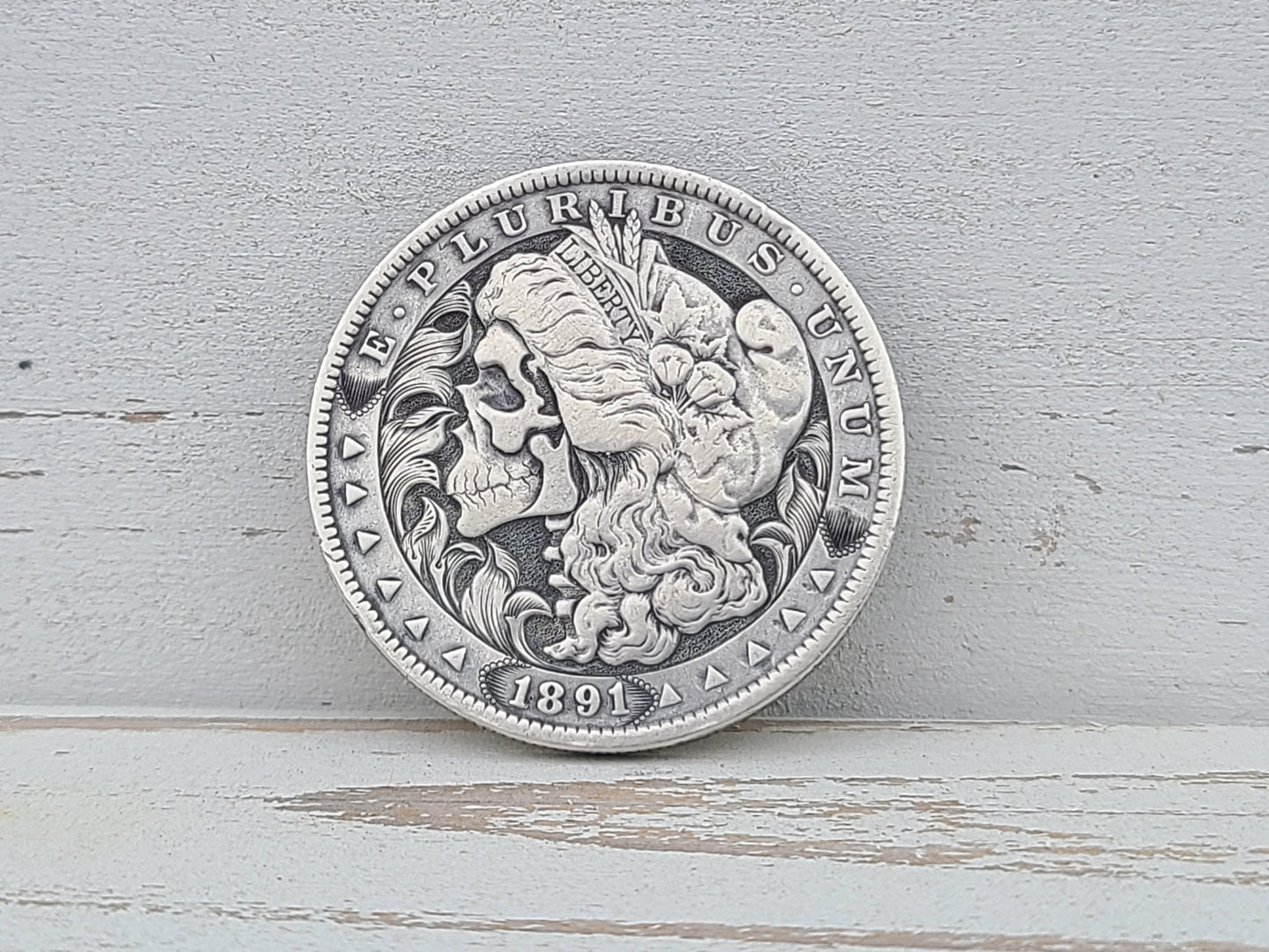 1891 Skull and Filigree Morgan Dollar